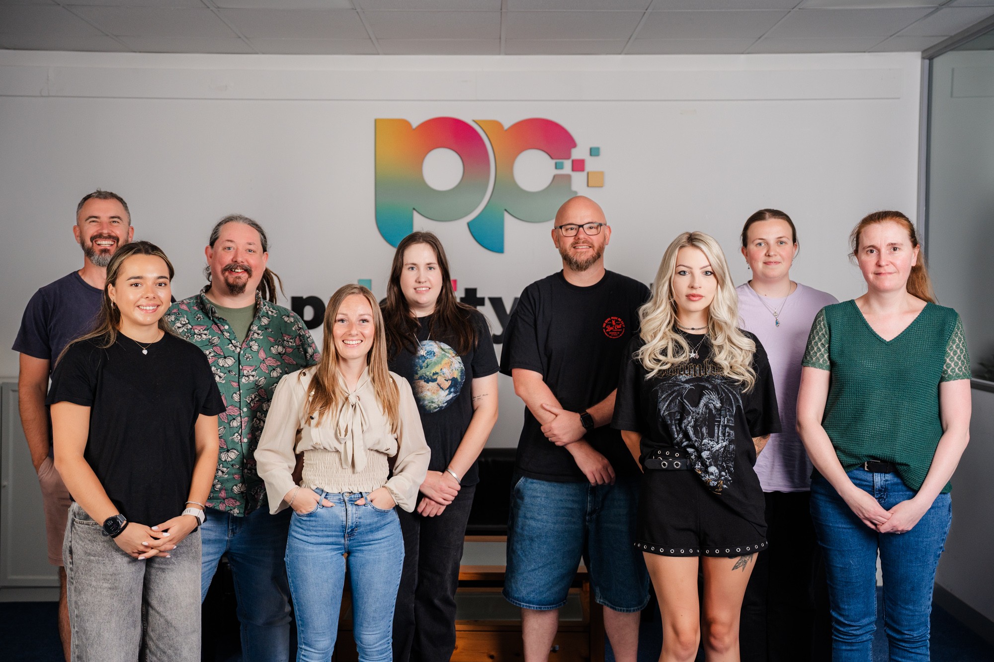 Priority Pixels team photo in office